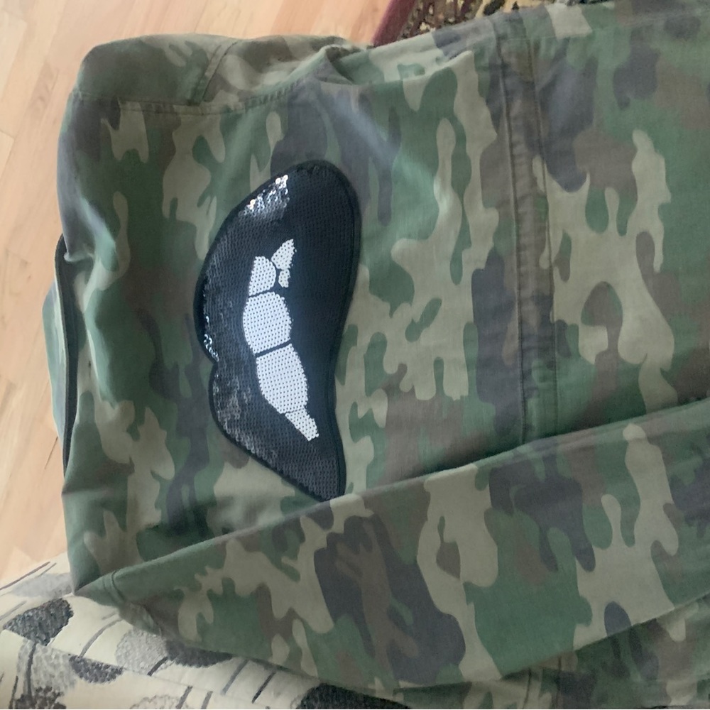 Camo jacket with sequin mouth patch